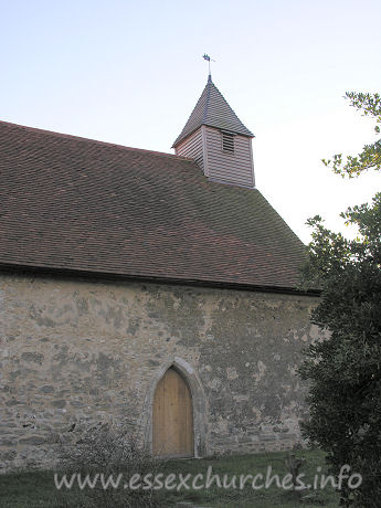 All Saints, Vange Church – The North door, with very tidy belfry sitting atop the church.