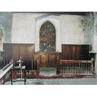 All Saints, Vange Church – Postcard 4: The chancel, before work commenced. Note the shattered E window. Fragments of which have been used in the current E window. Again, taken from a picture on display inside the church.
