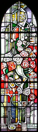 St Mary the Less, Great Warley Church – The writing on this glass reads "The winter is past ... the flowers appear on the earth". To the lower right-hand corner, the dedication reads "In memory of Norfor Evelyn Heseltine 1885-1968." The Heseltine family, and in particular, Evelyn Heseltine, were the main benefactors during the construction of this church, donating both the money and the land for its construction.