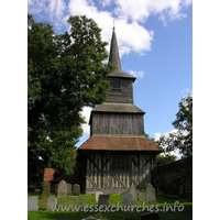 St Laurence, Blackmore Church – Exterior 2: Seriously, though, this really is one of the finest, if not the finest timber church tower in the country. This claim is upheld by Pevsner and many others. The tower consists of a lower storey with three lean-to roofs on each of the N, E and S sides. Directly above is an area of square weatherboarding. Above this, is another storey with four lean-to roofs, followed by what is a more common sight in this county - a square bell stage, topped with a shingled broach spire.