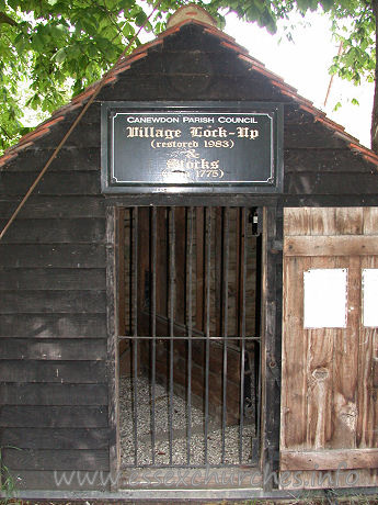 St Nicholas, Canewdon Church – The village lock-up and stocks.