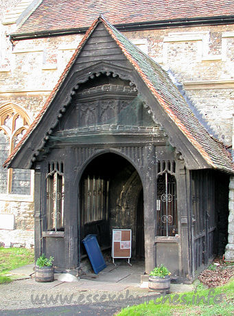 St Mary, South Benfleet Church – This lovely S porch has panel tracery in the spandrels of the doorway, an embattled beam, tracery panels in the gable, cusped bargeboarding, and a two-bay hammerbeam roof inside. All in all, a rather lovely piece of craftsmanship.