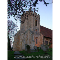 St Peter & St Paul, Hockley Church – Exterior 4: This is a rather unusual W tower, starting as a square tower with angle buttresses at its base, then becoming an irregular hexagon for its upper part. It is embattled and crowned by a recessed spire.