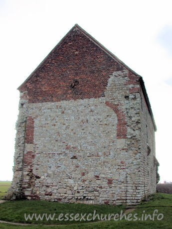 St Peter-on-the-Wall, Bradwell-juxta-Mare Church – The W wall, clearly showing the arched brickwork where this once joined onto an apsidal chancel. The chancel is marked on the ground. It was demolished once the chapel was put to alternative uses as a barn, sometime in the seventeenth century. Only in the early twentieth century was the building returned to its original use.