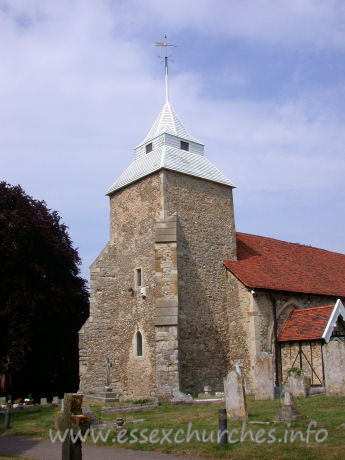 St Mary the Virgin, North Shoebury Church – This lower parts of the tower are C13, as is shown by the west windows. Later, the buttresses were added, and a two-step pyramid roof was added, the upper part broached.