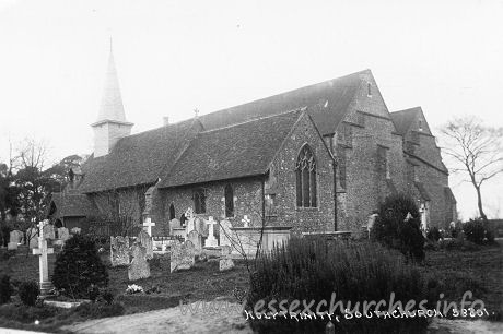 Holy Trinity, Southchurch Church – This postcard shows, quite clearly, the east end of the church, following the first phase of enlargement. Notice that the east end of the entire enlarged church is at the same level as the east end of the Norman church. And notice that the finish of the central east wall is the same as the finish as that of the north aisle. The next image shows an enlarge image of the east end.