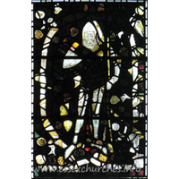 St John the Baptist, Thaxted Church – Stained Glass 12: This stained glass window, in the centre of the S window in the S transept, depicts Edmund Mortimer d.1381. This is believed to be the earliest piece of medieval glass in Thaxted. It used to be in the north transept, but was re-positioned after the great storm of 1763.
