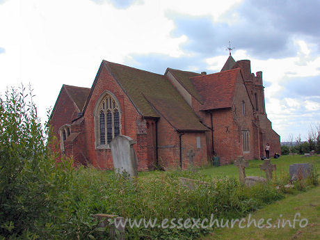 All Saints, East Horndon Church – Here we see the church from the NE, with my fiancee, Julie, examining the exterior windows.