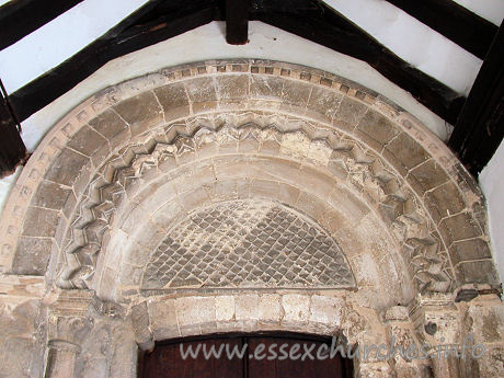 St Giles & All Saints, Orsett Church – The ornate Norman arch above the S doorway.