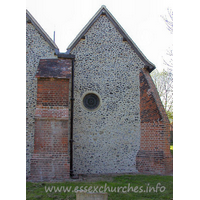 St Michael, Aveley Church – Exterior 4: A most peculiar window exists at the end of the N chancel chapel. Not a pretty sight in my opinion. I can only assume that this glass would 'make more sense' from inside the church.