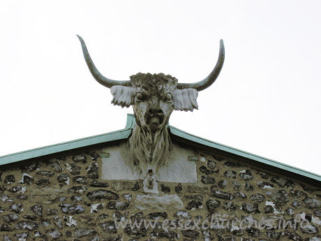 St Andrew, Hornchurch Church – Taken from the church's own website The horned bull's head on the east end of the chancel is an unusual feature to find on a church, as horns are more generally associated with the devil. It would seem that the church had the horned bull before the town was called Hornchurch, as the first written reference, in 1222, refers to 'monasterium cornutum' or 'horned church/monastery' at Havering. The first reference to the horns on the east end of the church is in 1610 when they were said to be made of lead. When they were repaired in 1824 they were found to be of copper. It is reasonable to suppose they had been replaced during the intervening 200 years, but neither mentions the stone head, merely the horns. There are numerous legends and theories to explain their existence and whilst the truth may remain obscure the head forms a unique feature of the church. In 1999 the copper horns were stolen from the bulls head. The horns are priceless and were never recovered. The Horns were replaced in 2001 allowing Hornchurch to live up to its name.