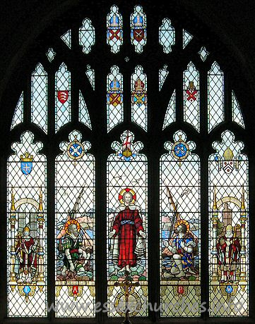 St Andrew, Hornchurch Church – Image reproduced by kind permission of Julie Archer. From the church's own website The E window replaces one destroyed by enemy action in the second world war and is dedicated to the memory of Thomas Mashiter. It shows the arms of the Dioceses of Rochester, London, Chelmsford and St Albans and those of the county of Essex and the Urban District of Hornchurch. From L to R this window shows: Edward the Confessor in front of Westminster Abbey holding in his left hand a ring, referring to the legend of Have-a-ring. Next St Andrew, in the centre Christ standing on the shores of a lake, next St Peter and on the extreme right William of Wykeham with New College Oxford in the background. The theme is "Follow me and I will make you fishers of men". The window was designed by Gerald Smith and made by the Nicholson Stained Glass Studio on 1954.