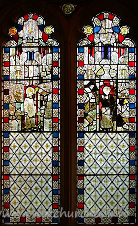 St Edmund, Abbess Roding Church – Stained glass depicting a Bishop and a female saint. This is surrounded by tabernacle-work.