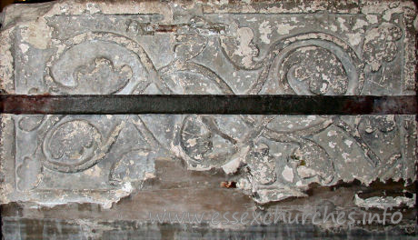 St Edmund, Abbess Roding Church – This side of the font shows a unusual trail shape.