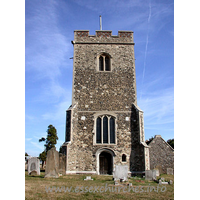 St Mary, Chadwell St Mary Church – Exterior 3: Diagonally buttressed tower, with W doorway. Small ogee-headed niche to it's right.