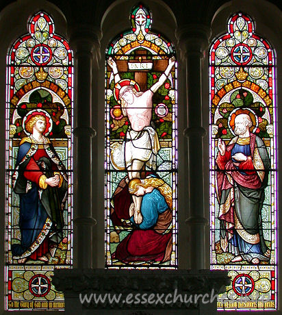St Catherine, Wickford Church – The East window depicts Jesus on the cross, flanked by Saints. It is in memory of Henry Stone, churchwarden during the rebuilding of the church. It was recently (1998) restored.