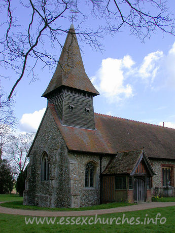 St Mary, Broxted Church – The belfry is weatherboarded, and stands on four posts.