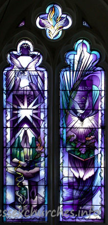 St Mary, Broxted Church – One of two two-light 'hostage' windows by John Clark. This window symbolises Freedom. It was put in in 1993 to commemorate the long cruel captivity and eventual release of journalist John McCarthy, an active churchman, whose home before his kidnapping was the big house next door.