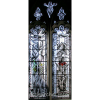 St Mary, Broxted Church – Stained Glass 3: One of two two-light 'hostage' windows by John Clark. This window symbolises Captivity. It was put in in 1993 to commemorate the long cruel captivity and eventual release of journalist John McCarthy, an active churchman, whose home before his kidnapping was the big house next door.
