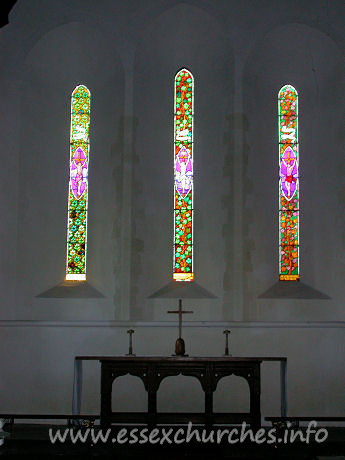 St Mary, Broxted Church – Original lancet windows and triptych reredos. The East window is by Francis Stephens.