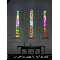 St Mary, Broxted Church – Interior 1: Original lancet windows and triptych reredos. The East window is by Francis Stephens.