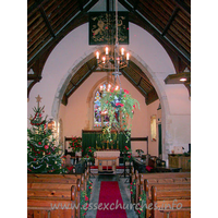 St Peter, Paglesham Church – Interior 1: A beautiful church. And, fortunately for me, it was open when I visited. This pointed arch may once have been a semi-circular Norman chancel arch. Above can be seen the Royal Arms of George III, in their original position.