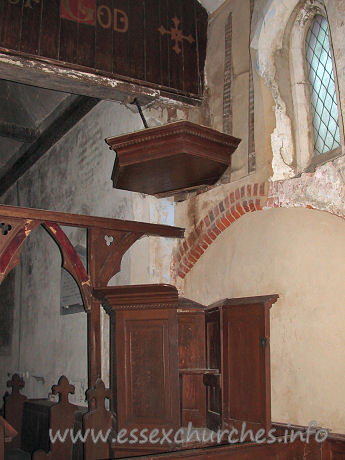 St Mary, Mundon Church – The pulpit, directly in front of the blocked early C16 archway that would have once lead into the S chapel.