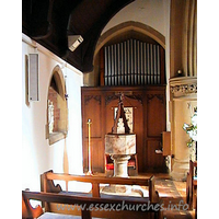 St Mary, Langdon Hills New Church – Interior 2: The font now stands in the Lady Chapel. The unusual wooden lid is dedicated to Thomas Monk who was a church warden. ‘In memory of Thomas Monk who fell asleep, Feb 22nd 1919’ This image and supporting text was supplied by Ken Porter.