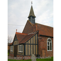 Holy Trinity, North Fambridge Church – Exterior 2: The W front was much altered in 1890, with the addition of half-timbering and pebbledash.