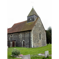All Saints, Sutton Church – Exterior 3: The north wall, clearly showing a Norman window in the nave.