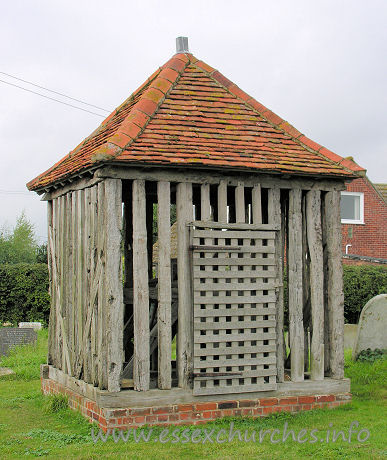 All Saints, Wrabness Church – This is the Wrabness bell tower. Though it is really more of a bell cage. It is likely dated in either C17 or C18. Pevsner describes it as being like a village lock-up.