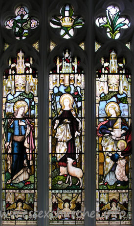 St Mary the Virgin, Great Bardfield Church – Chancel N wall - Three Girl Saints. St Margaret, St Agnes & St Cecilia. In memory of Adela Minna Lampet, who died, aged 13 years on November 14th 1873.