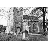 St John the Baptist, Mucking Church – Exterior 2: This view is sadly no longer available, as the whole church is now masked by huge trees. From Pevsner: "The W tower is mostly C19, but the S doorway which serves as a porch has recognisable C15 parts." This image is the copyright of Ian Gellard. Reproduced by kind permission. For more details, you can email Ian at the following address: ian@photosofessex.co.uk. Ian has a CD full of old pictures of Essex available, you can see more details at his website, www.photosofessex.co.uk.