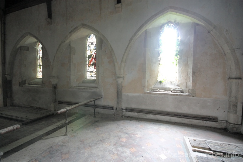 St John the Baptist, Mucking Church – Three arcades in the chancel wall, which would have once led into a C13 N chapel.