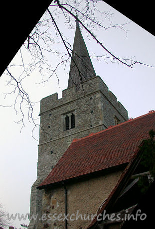 St Mary Magdalene, Great Burstead Church – The 14th century W tower, with angle buttresses has a tall timber spire.