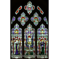 St Mary Magdalene, Great Burstead Church – Stained Glass 1: This Kemp & Co. window depicts the crucifixion scene in three panels. It dated from 1928. Parts of the tracery itself, though, date from the 14th century. The window was given by Mrs Goodchild of Stock, whose husband had farmed locally. Until this window was installed, the east window had been blocked.