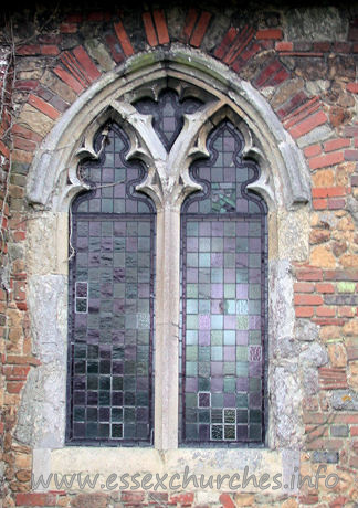 St Lawrence & All Saints, Steeple Church – Note than randomness of even the window dressings here.
