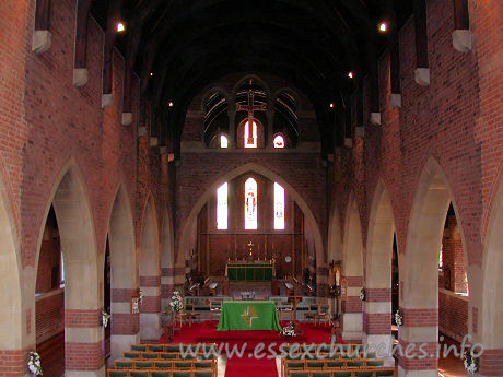 All Saints, Southend-on-Sea Church – This photo shows the view from the W gallery, looking towards the chancel. Above the chancel arch can be seen a large triple arch, as the chancel rises to the same height as the nave.