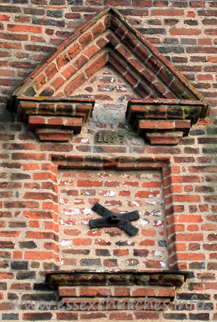 St Giles, Mountnessing Church – The pedimented window dates the W wall to 1653.