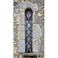 Dedication Unknown, Mashbury Church – Exterior 7: One of two Norman windows in the north wall.
