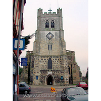 Holy Cross, Waltham Abbey Church – Exterior 7: The West Tower was an addition to the church, made after the Dissolution in 1556-8. It is a sign of the changeover from monastic to parochial usage. The upper portion of the tower has been much restored in latter times, and does nothing to complement the lower part.