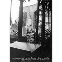 St Peter Ad Vincula, Coggeshall Church – Postcard 9: One of a series of 8 photos bought on eBay. Photographer unknown. "From the choir stalls, showing only remaining part of North wall." - dated September 1940.