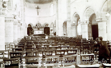Our Lady of Light (Catholic), Clacton Church – The neo-Norman style is highly evident here, with the low circular piers, the crossing with crossing tower, the transepts with an eastern aisle, and the apse with a narrow ambulatory.