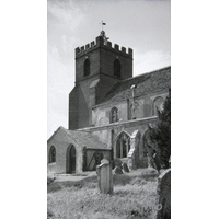 St Andrew, Helion Bumpstead Church – Postcard 1: Taken from a picture in the church. Note the old porch, and the existence of the stone tracery in the windows. Compare this with Exterior Image 1.