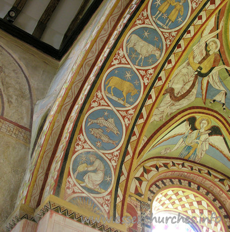St Michael & All Angels, Copford Church – The left-most part of the underneath of the chancel arch, which depicts all 12 signs of the zodiac. From bottom to top can be seen: Aquarius, Pisces, Aries and Taurus.