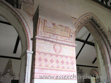 St Michael & All Angels, Copford Church – Another springer on the S wall of the nave. Note the two different styles of arch on either side. The arch to the left is pointed, with angled shafter responds. To the right, the arch is altogether rather different. Both the arch and it's response are triple-chamfered, and are constructed entirely of brick. However, only the outer order uses Roman bricks. The inner orders appear to use home-made or imported bricks, yet the date is apparently no later than c.1300. According to Bettley's Buildings of England: Essex, these bricks are therefore amongst the earliest medieval ones in England.