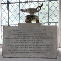 St Mary & All Saints, Lambourne Church – Monument 10: To the affectionately belov'd and truly honor'd memory of Matilda Lockwood Maydwell, who in the bloom of life resign'd herself to her God the 22nd of March A.D. 1800. And to her infant daughter aged three weeks and two days. The much afflicted husband and father erects this small token of his sincerest regard. The Lord gave and the Lord hath taken away. But blessed be the name of the Lord.